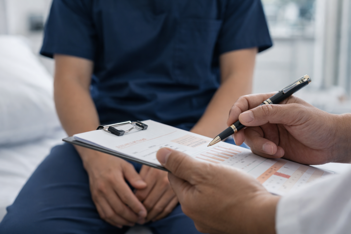 Doctor reviewing medical results with patient during STD or STI consultation
